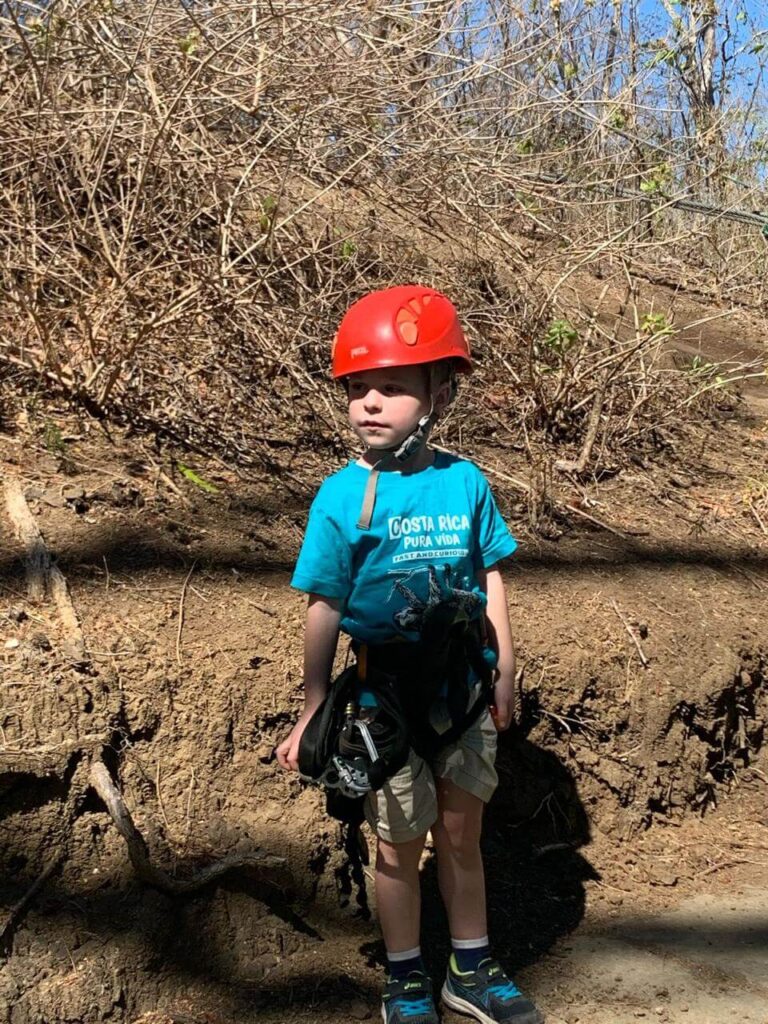 Expert guides assisting guests on a Tamarindo zipline adventure